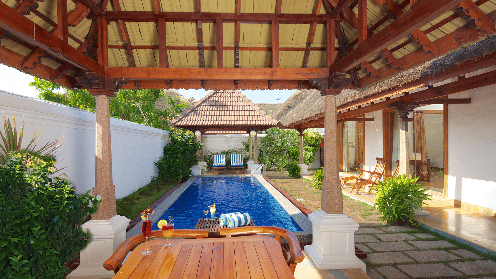 Private pool seen from a wooden gazebo