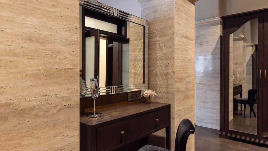 Presidential Suite dressing area with a vanity table near the entrance at Kenilworth Hotel, Kolkata.