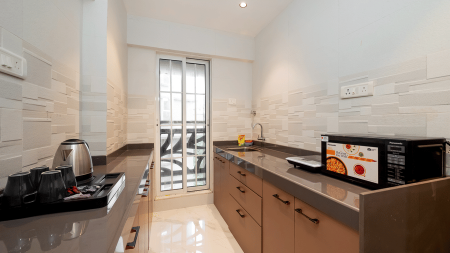 Well equipped kitchenette in a serviced apartment near Mumbai Airport