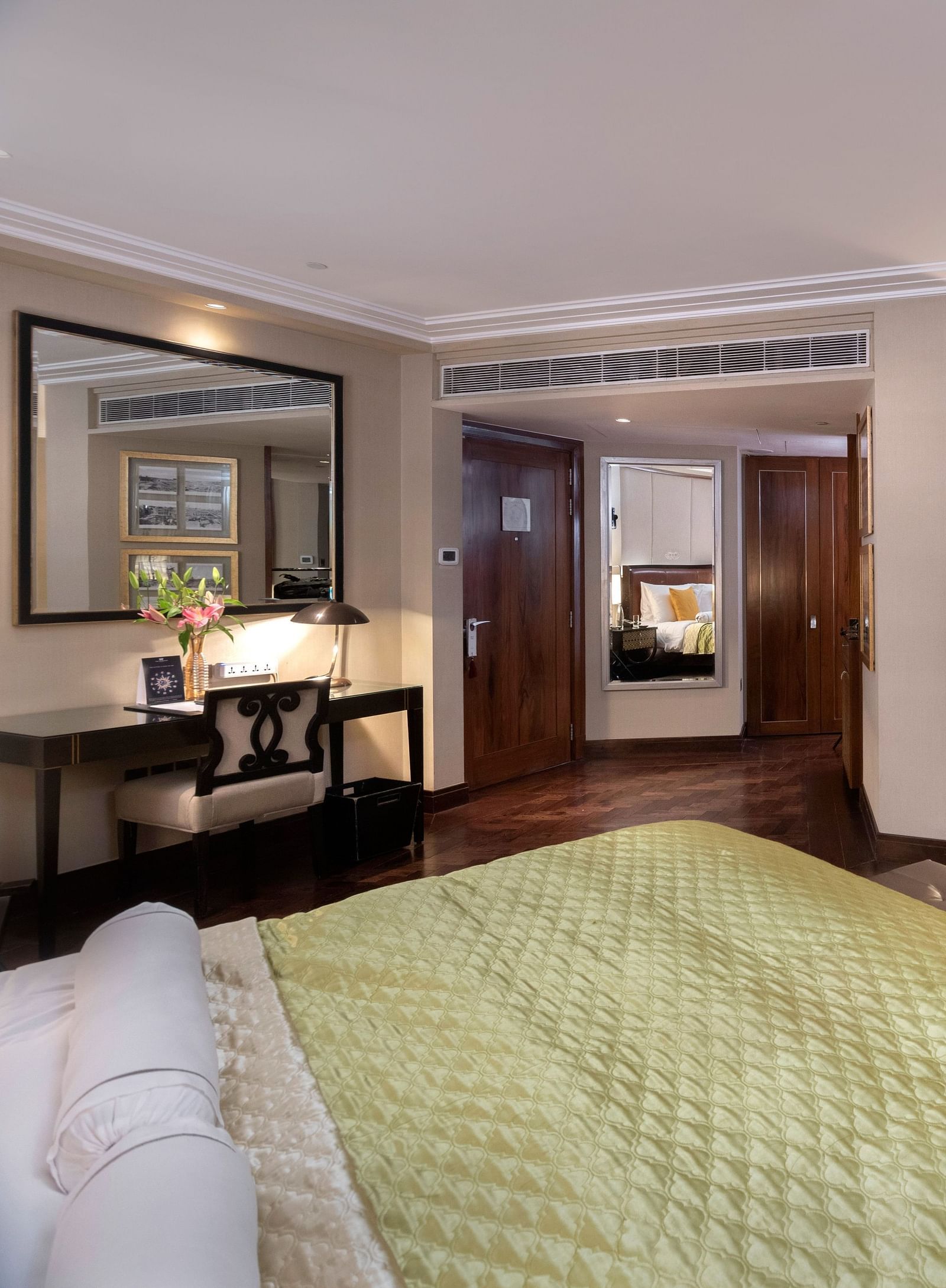 Claridges Cabana Executive Suite with a bed, study area and television in front of the bed The Claridges, New Delhi
