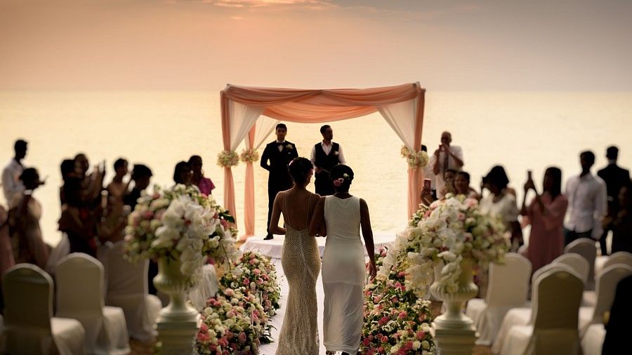 image of the bride accompanied by her mother walking down the aisle - Maikhao Dream Villa Resort & Spa, Phuket