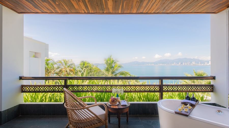 An image of a sitting area with a balcony view - Alibu Resort Nha Thrang