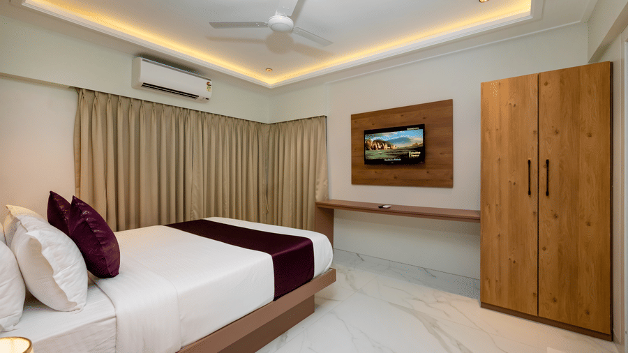 Spacious king bedroom with wardrobe at Home2 Residency, Mumbai Airport