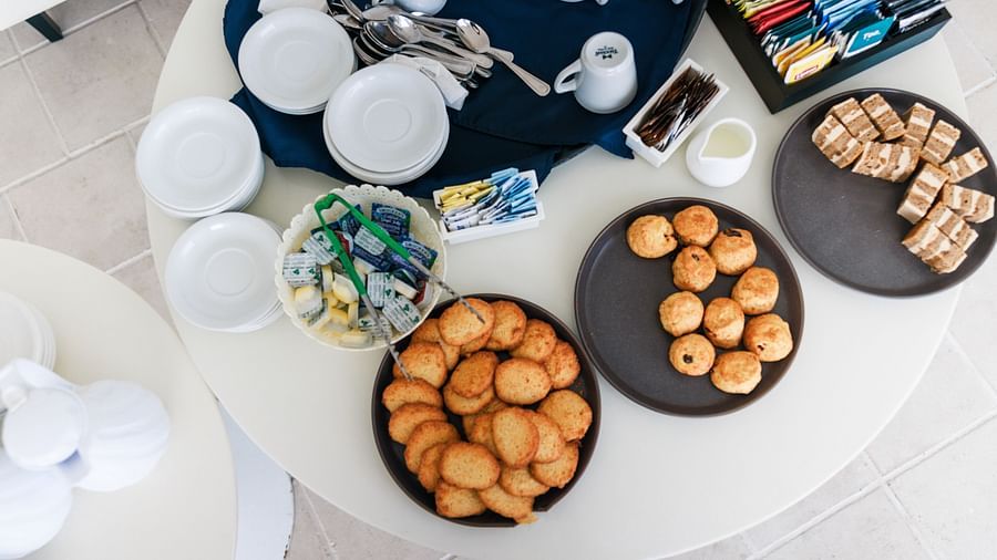 an aerial view of food presented on a dining table - The Soco House