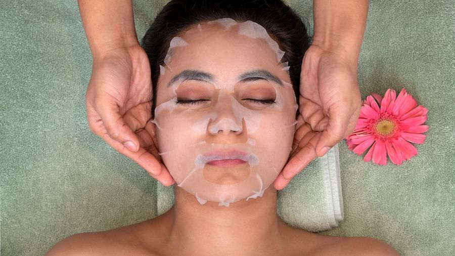 A woman receives a pampering face pack treatment at Cinqtuair Spa in New Delhi