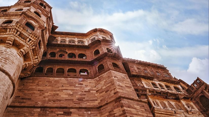 Historic Indian fort with arched windows and sunlight