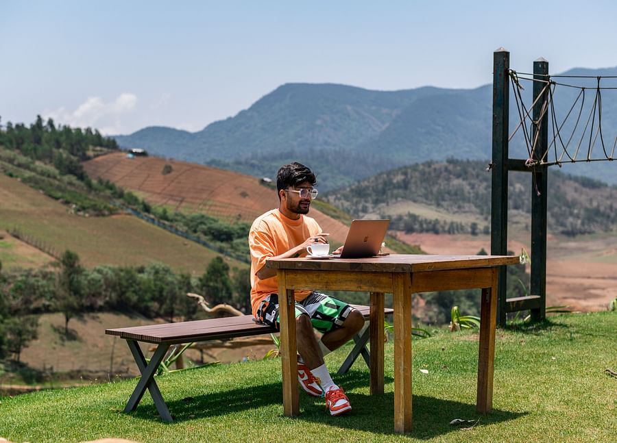 a man using his laptop