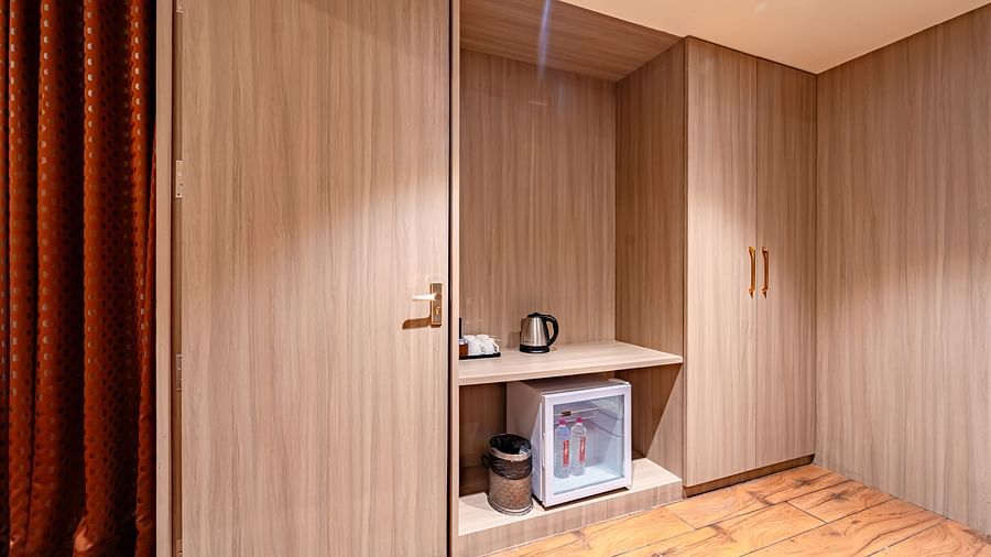 Family Room features ceiling-length cupboards that provide ample storage space at Crescent Spa & Resort, Indore
