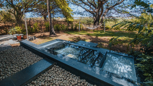 A swimming pool in The Serai Kabini - The Serai Kabini