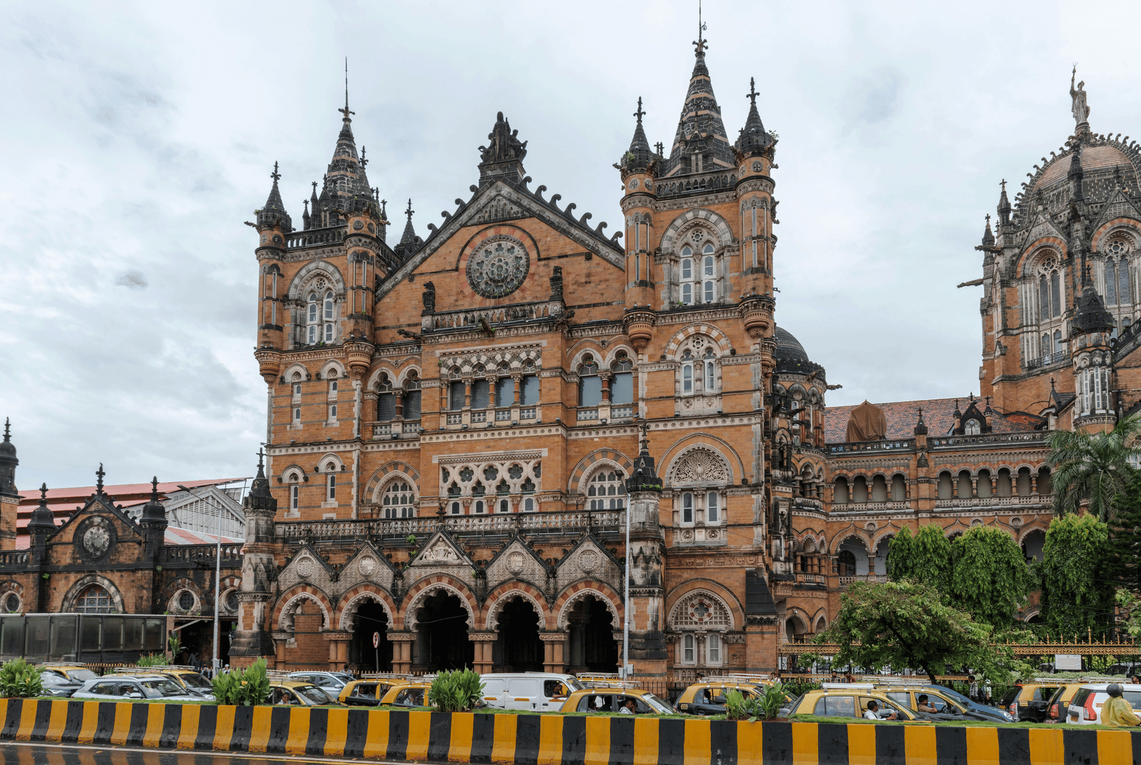 A large, historic railway station, the Chhatrapati Shivaji Maharaj Terminus, with Victorian-Gothic architecture.