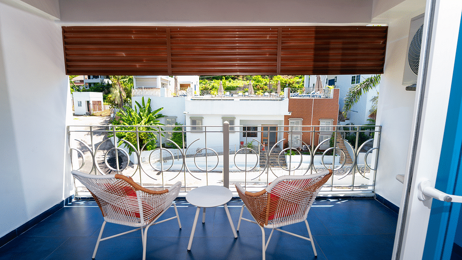 An image of a balcony offering the views of the garden below it - Hotel 39, Jamaica (Montego Bay)