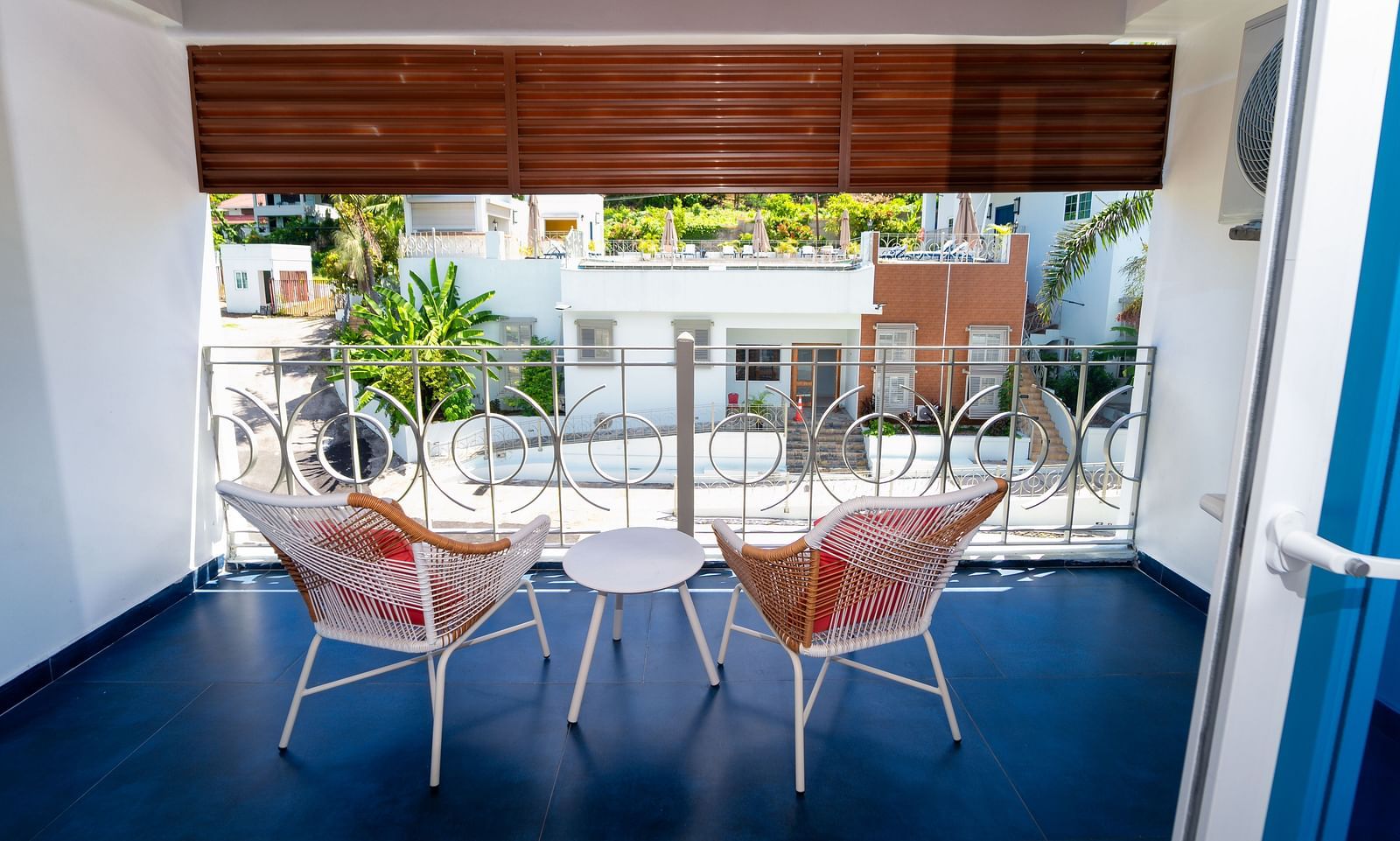 An image of a balcony offering the views of the garden below it - Hotel 39, Jamaica (Montego Bay)