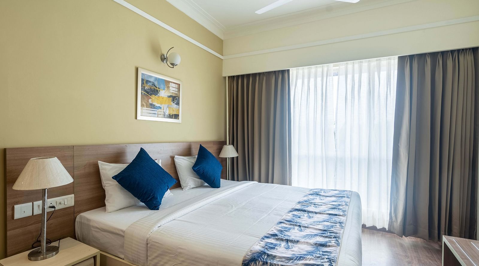 a double bed inside Premium Studio - Starlit Suites Newtown, Kolkata