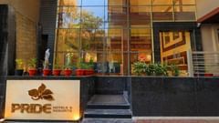 Facade of a property under Pride Hotels and Resorts with its name written at the entrance
