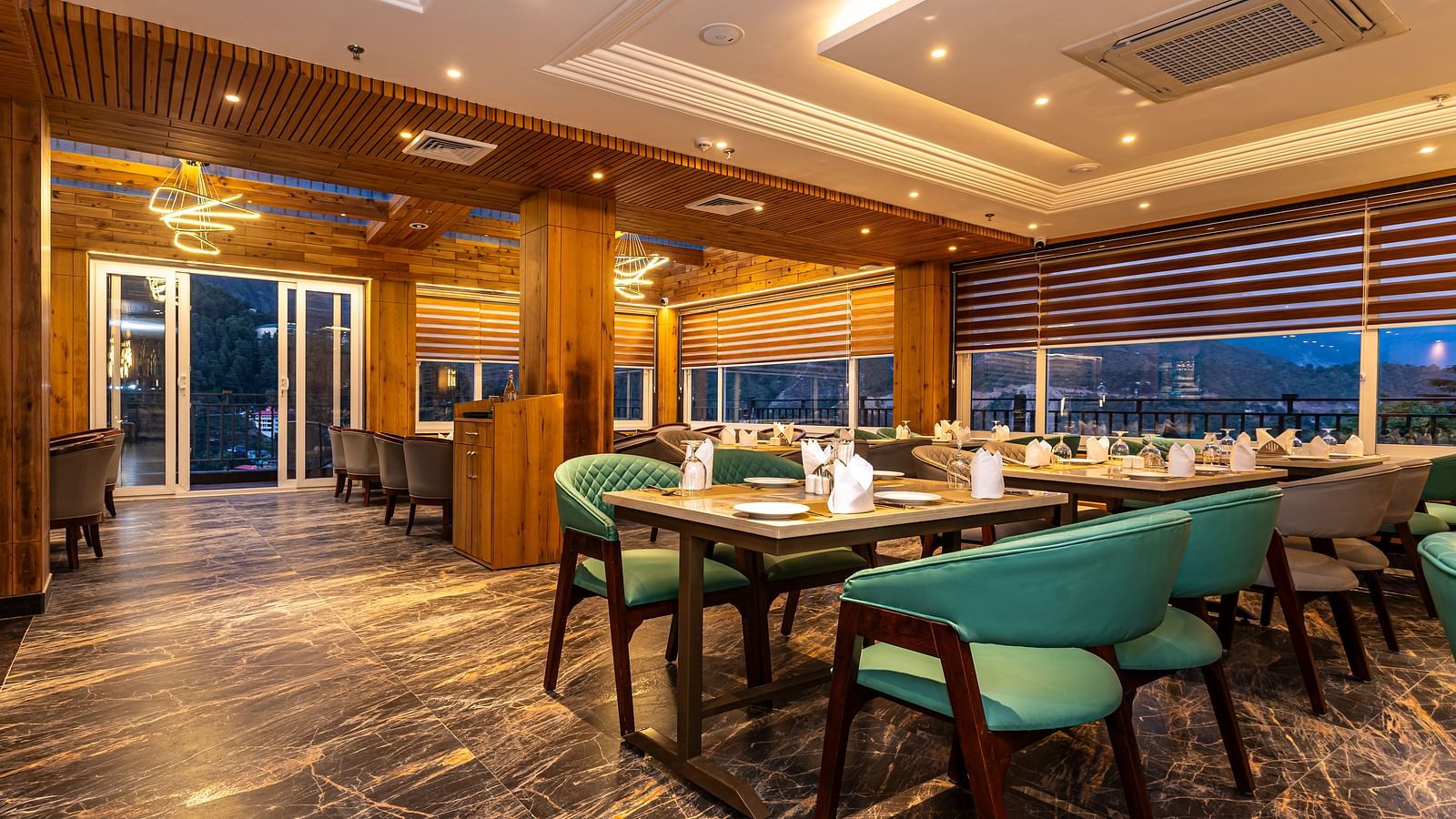 An image of a restaurant with seating arrangement and tables laid out with cutlery - The Belvedere Himalayan Retreat, McLeodganj