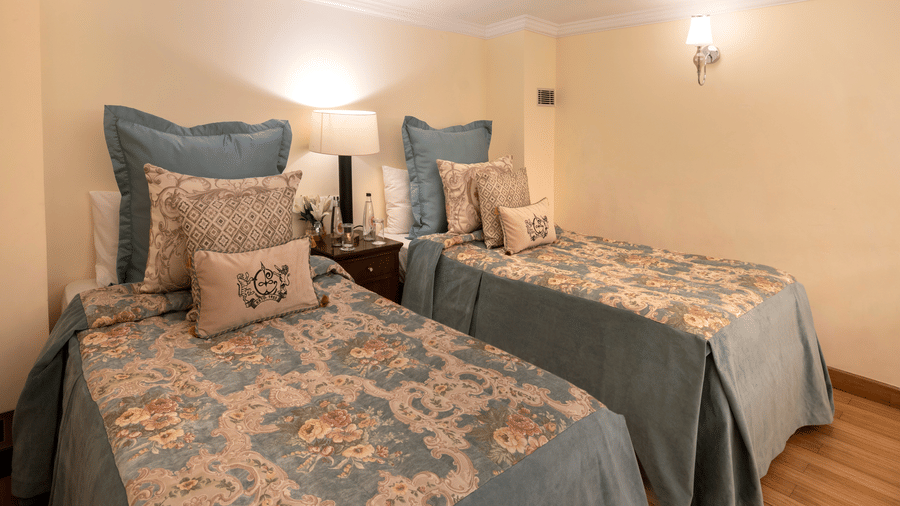 image of twin beds at the Duplex Family Suite - The Claridges Nabha Residence