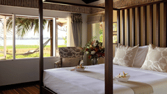 bedroom of the Waterfront Villa Rooms in Kabini at The Serai  30928