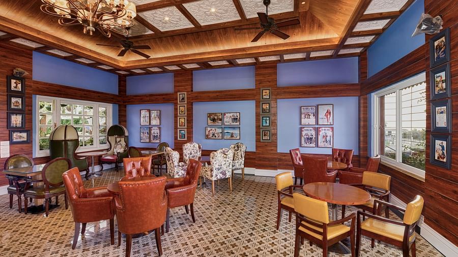 the indoor seating space at the coffee shop - Mayfair Himalayan Spa Resort Kalimpong