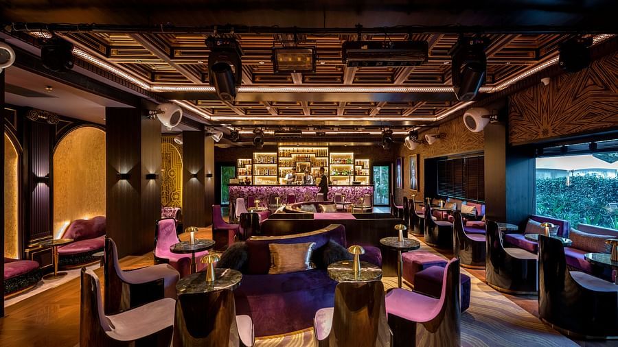 Image of Aura bar with seating area at The Claridges New Delhi