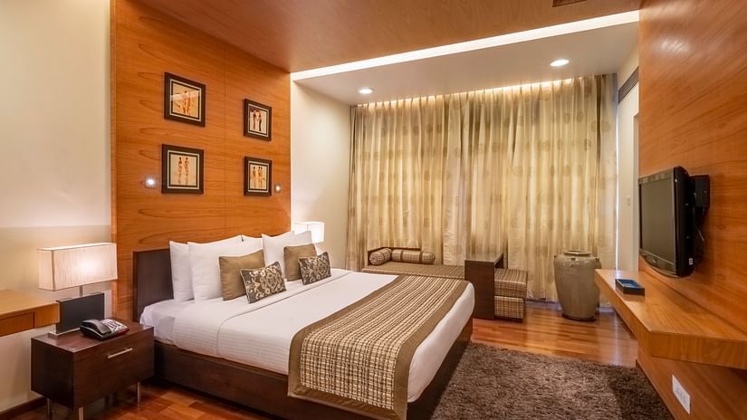 close-up side view of the king size bed in the Russel Suite at Kenilworth Hotel, Kolkata