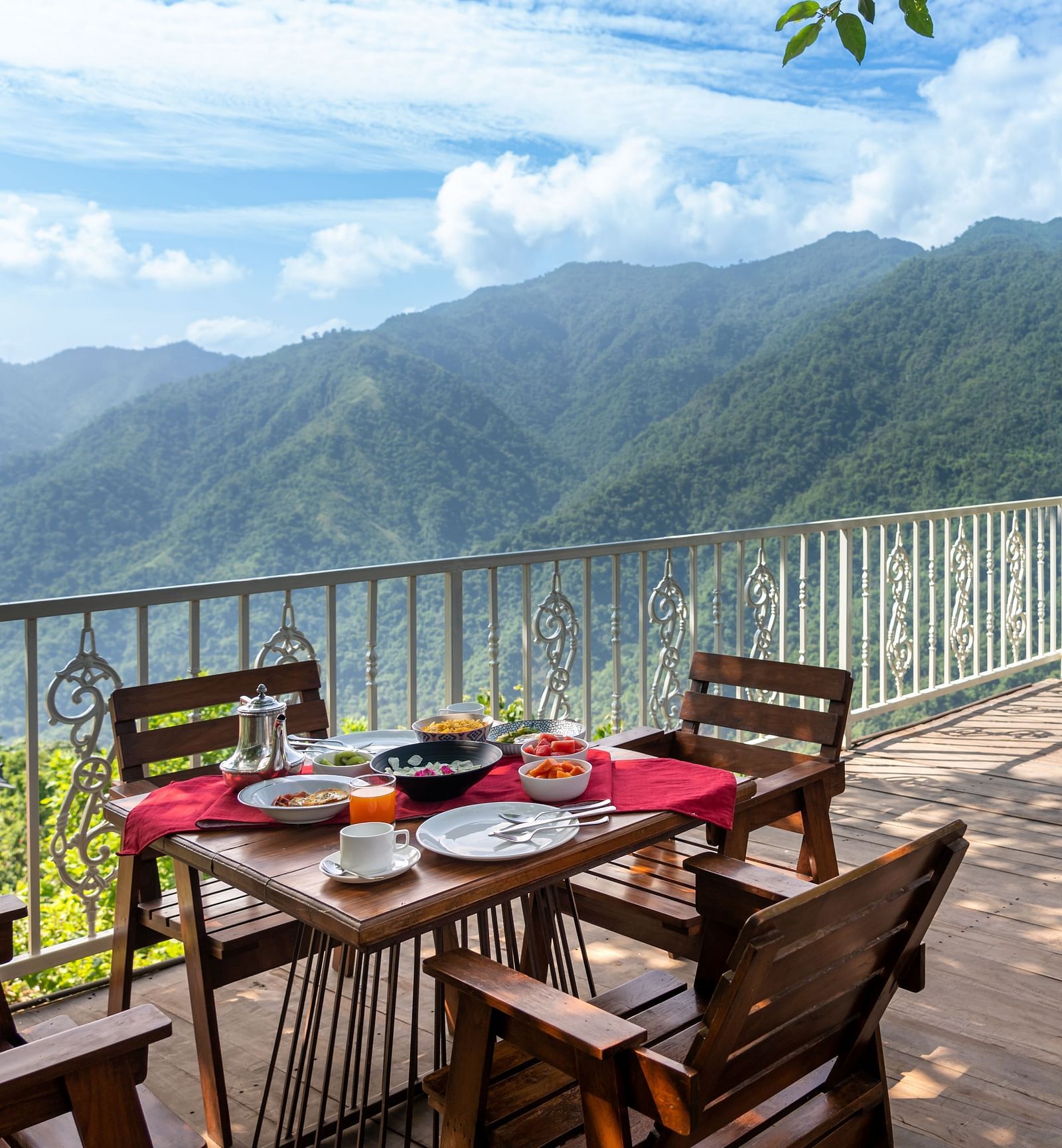 alfresco seating arrangements with mountain views - neer ganga Resorts