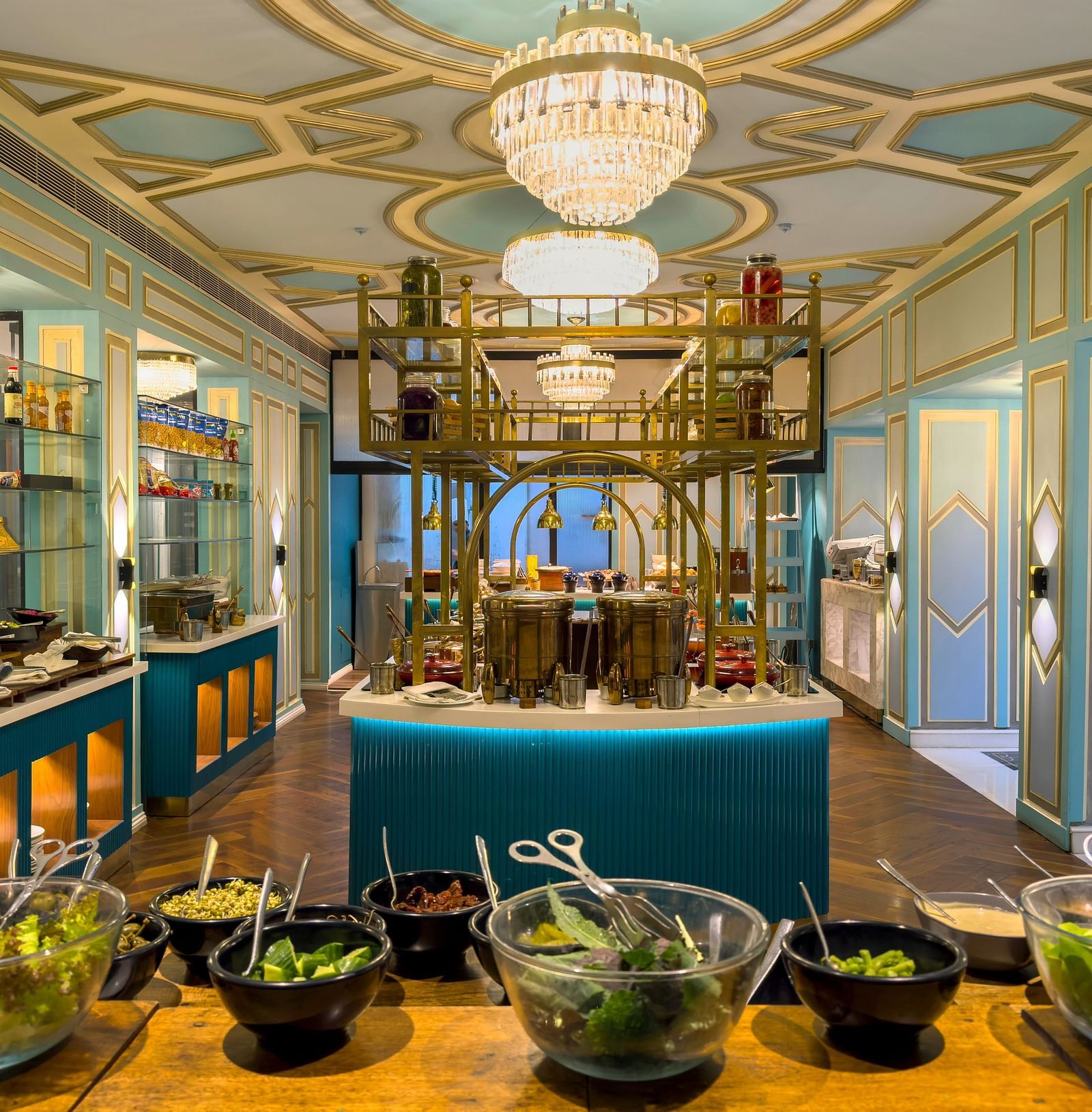 a full view image of the lutyens deli multi cuisine restaurant with salad bowl at the forefront - 