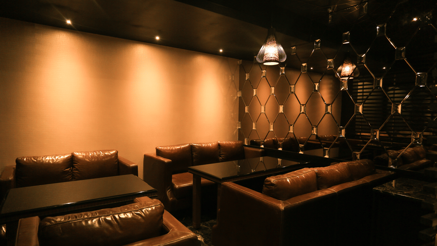 sofas inside the Lounge area at Alchemy, our in-house bar in Chennai - Raj Park Hotel, Chennai