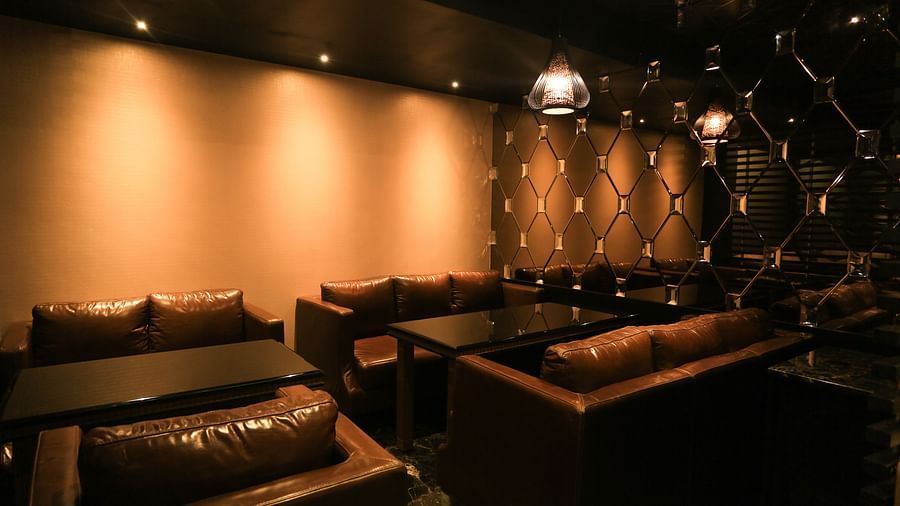 sofas inside the Lounge area at Alchemy, our in-house bar in Chennai - Raj Park Hotel, Chennai