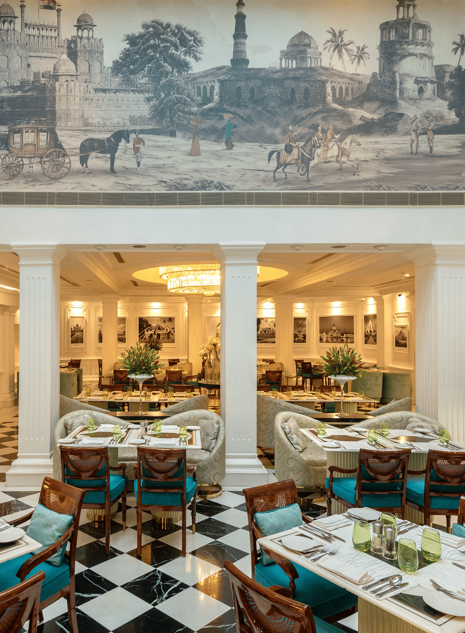 Image of a dining space with art on the wall - Claridges Collection