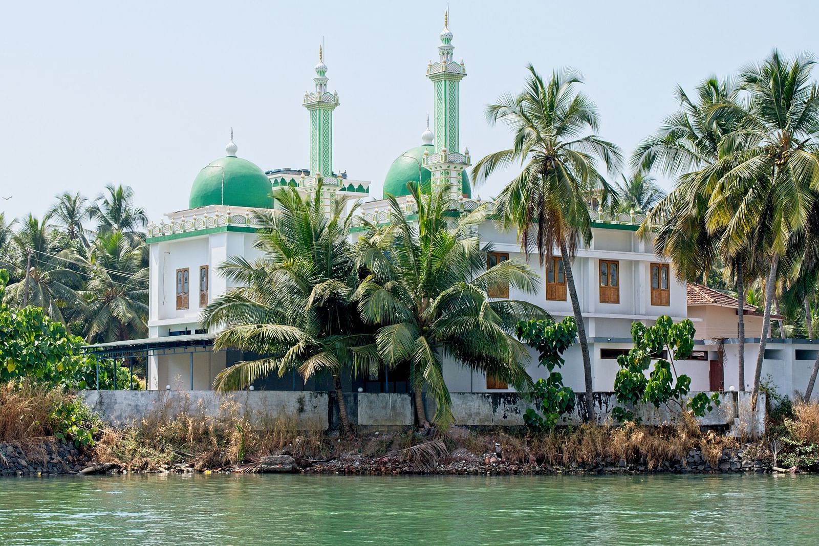A mosque located besides a water body