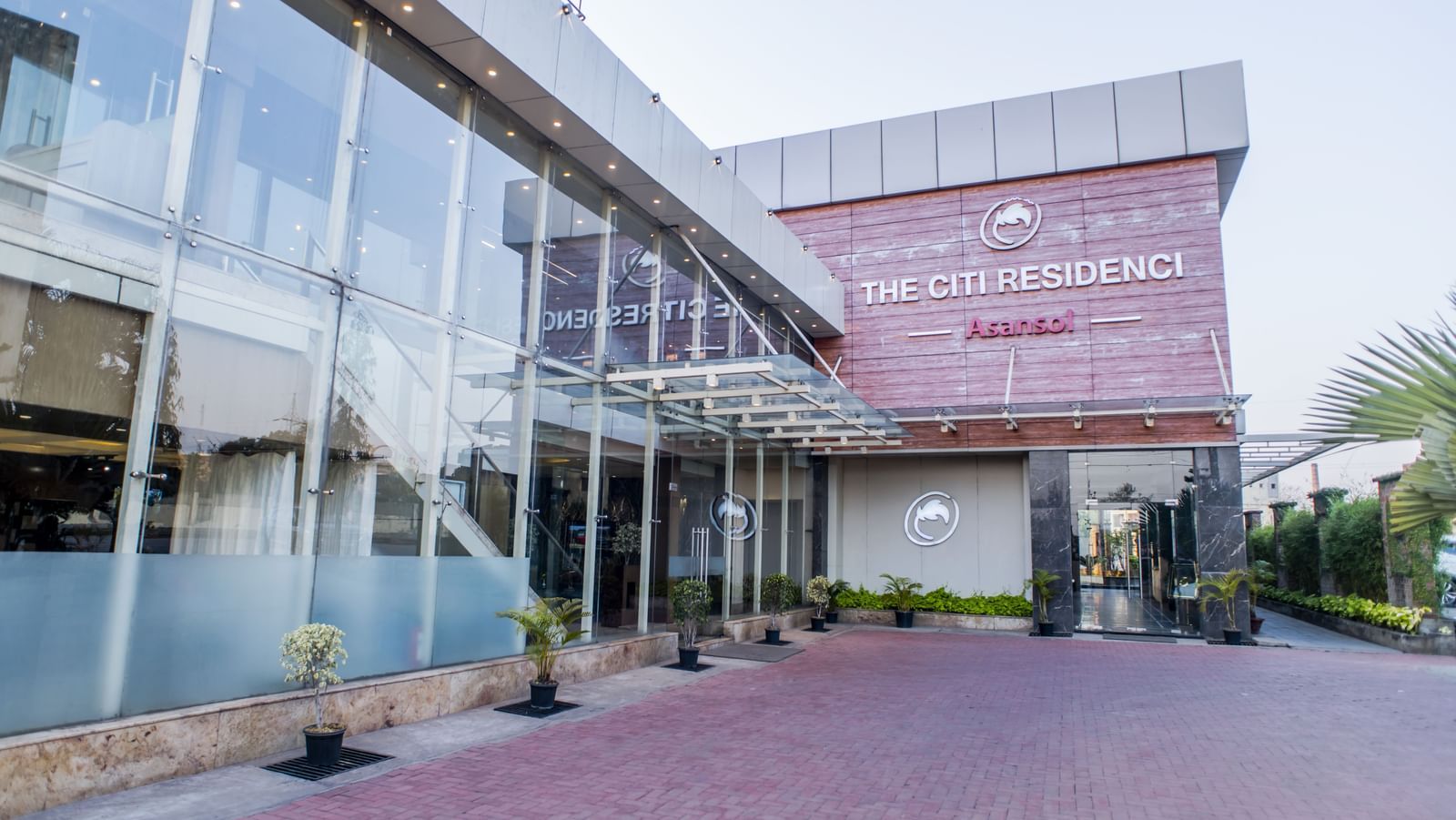 A view of the modern architecture of The Citi Residenci Hotel, Asansol, from the outside.
