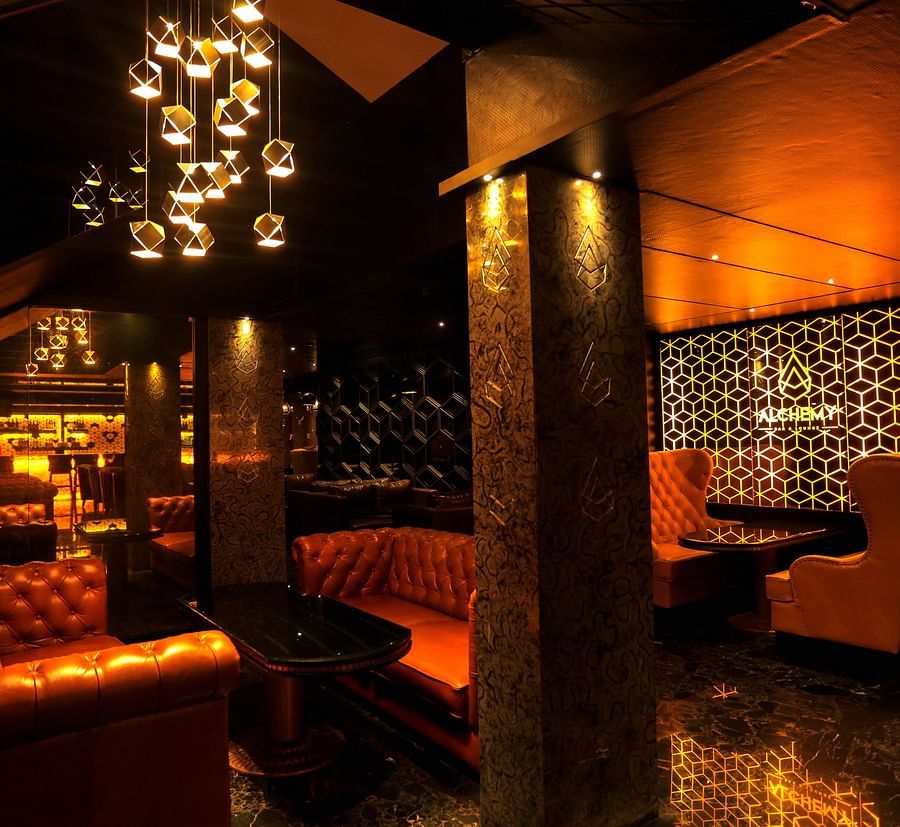 sofas inside the Lounge at Alchemy, our in-house bar in Chennai - Raj Park Hotel, Chennai
