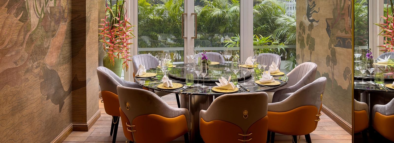  image of dining area with windos above and in front of it providing amazing dining experience at the claridges new delhi