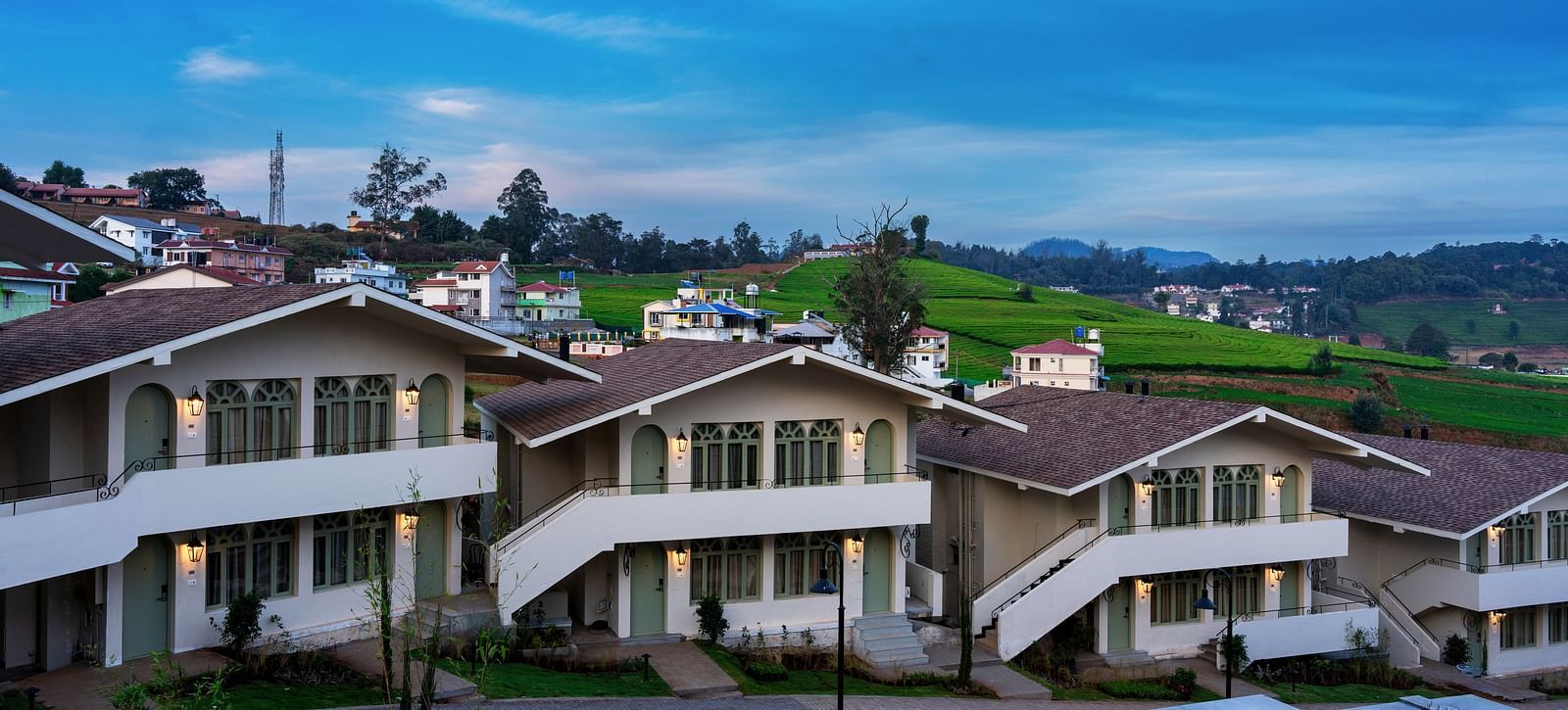 An image of a few similar-looking building belinging to a resort | Mango Hill Shola, Ooty