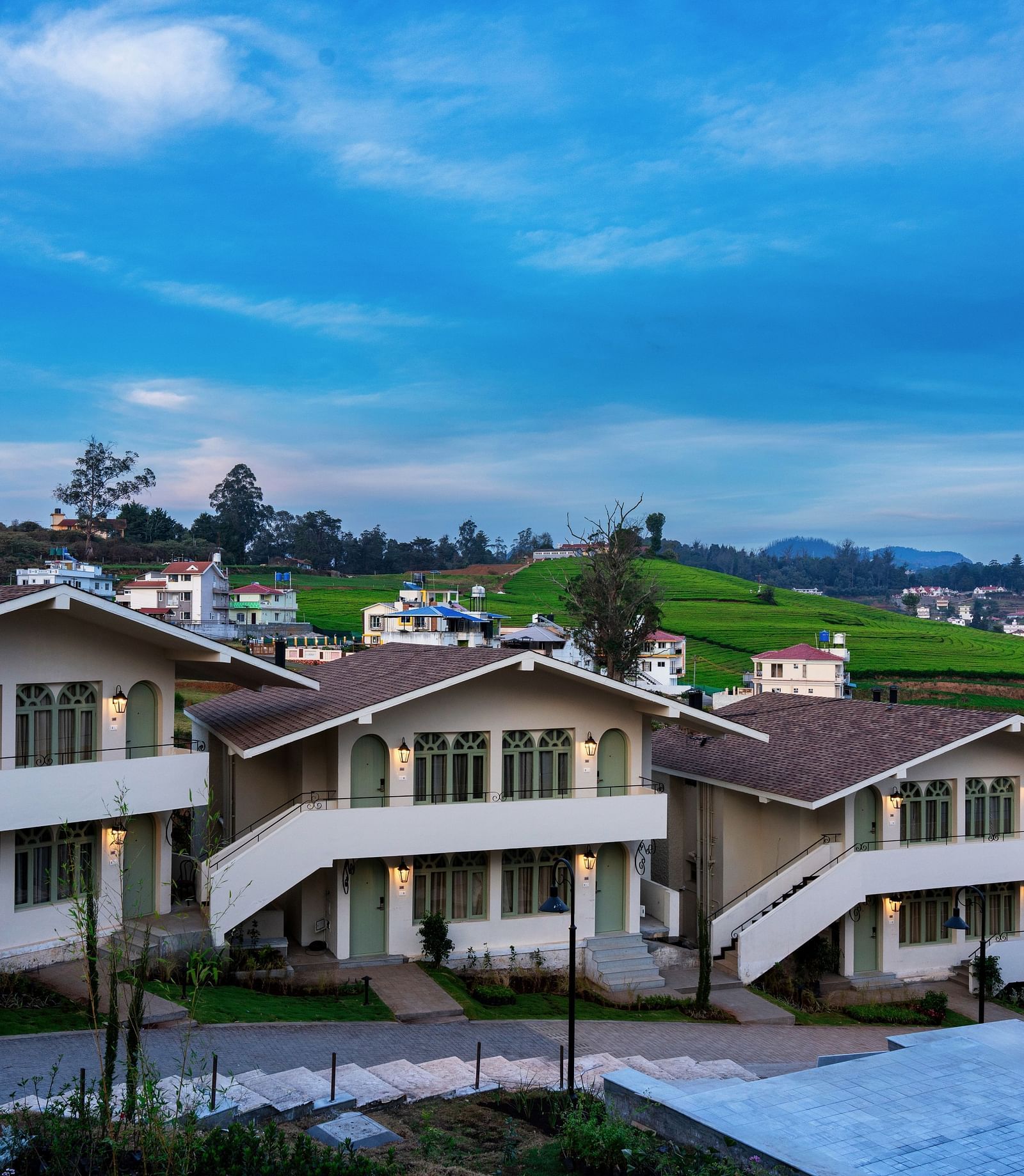 An image of a few similar-looking building belinging to a resort | Mango Hill Shola, Ooty