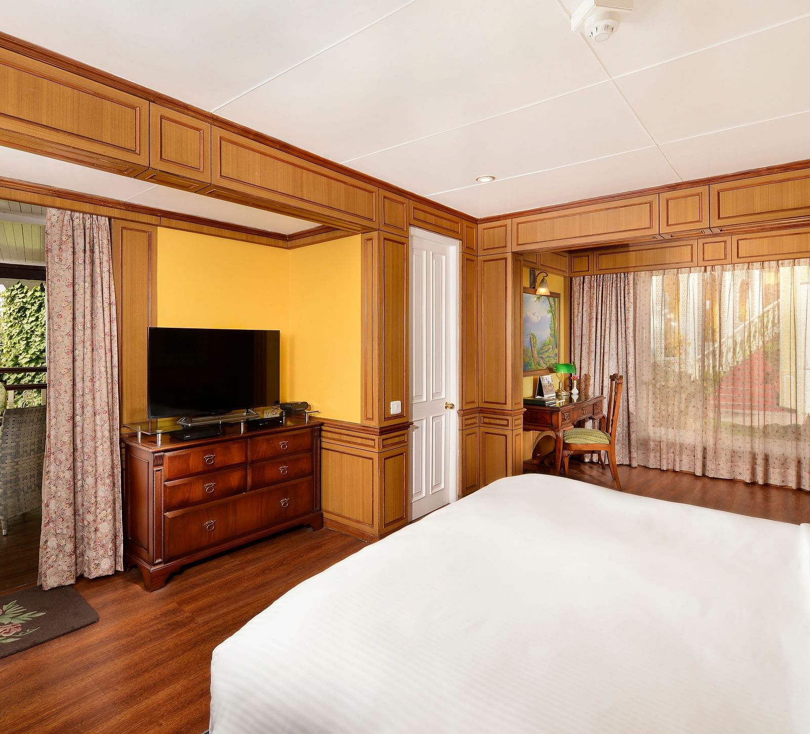 view from the bed facing the TV - Mayfair Himalayan Spa Resort Kalimpong