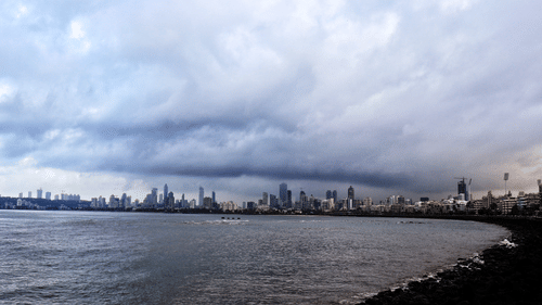 view of the sea by the rocks at Marine Drive