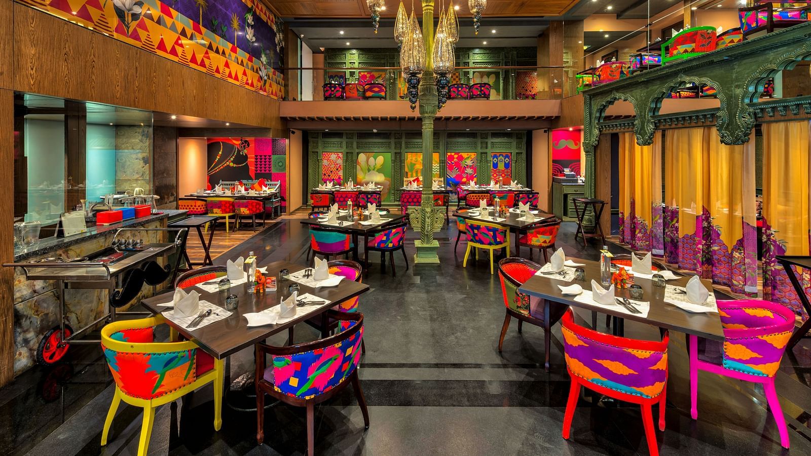 Seating arrangement of the restaurant at Grand Chennai By GRT Hotels.