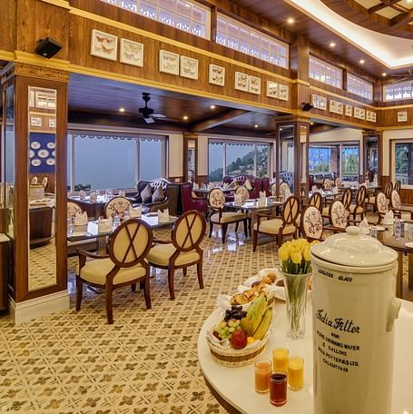 the indoor seating space of a restaurant - Mayfair Himalayan Spa Resort Kalimpong