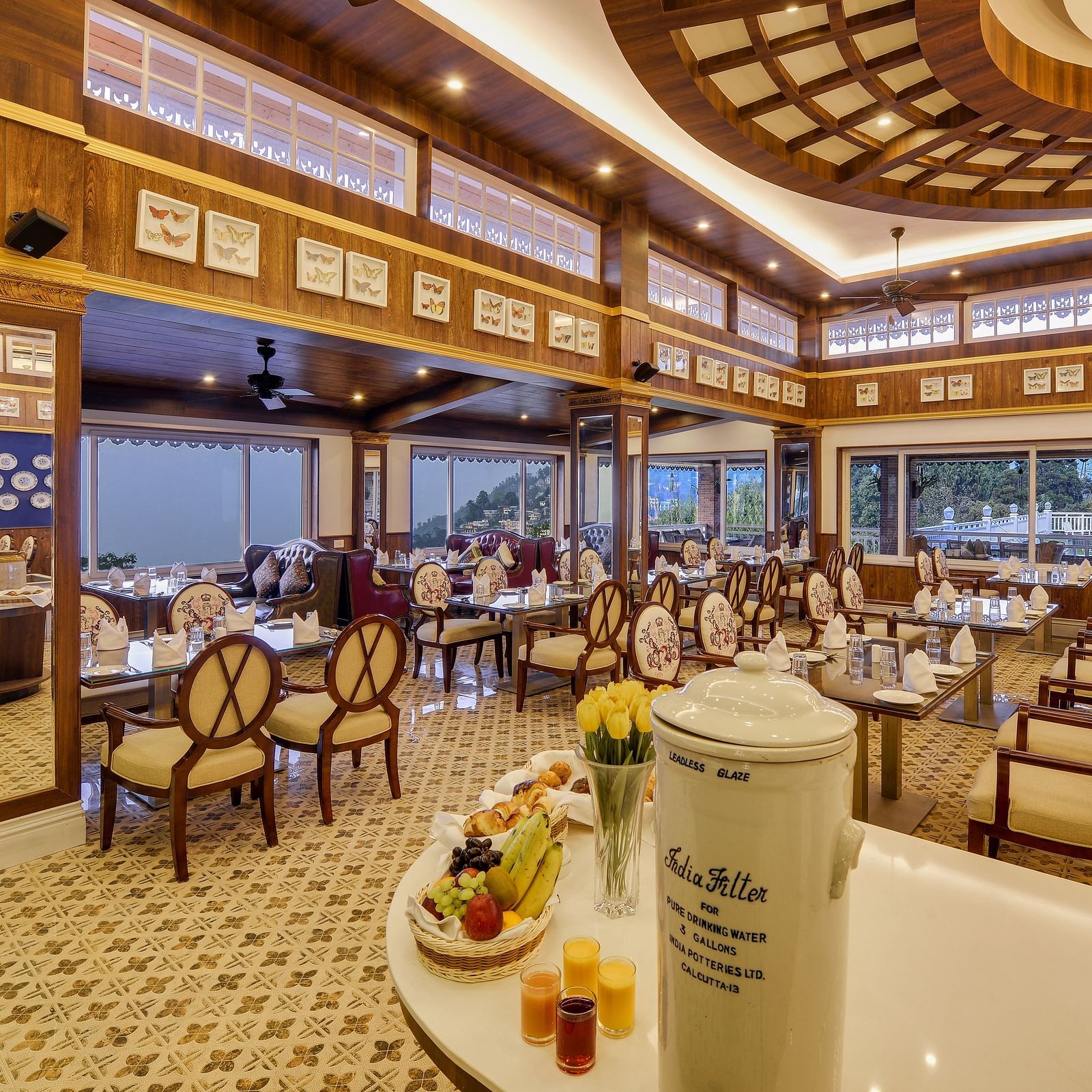 the indoor seating space of a restaurant - Mayfair Himalayan Spa Resort Kalimpong