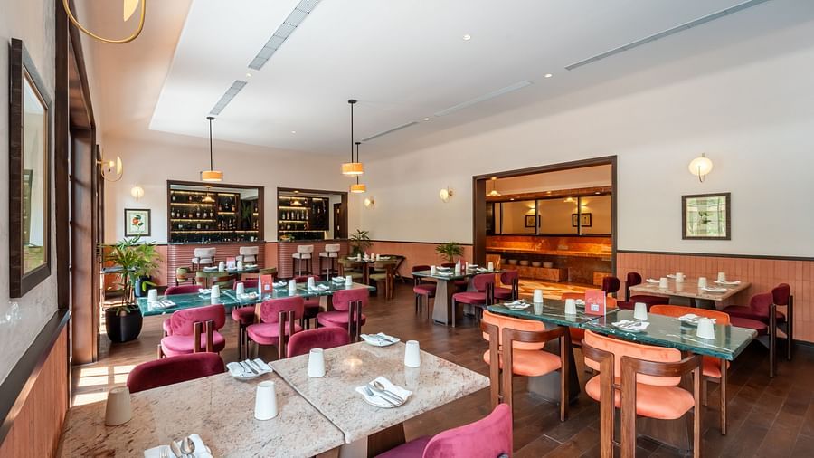 Elegant restaurant interior with seating at Jehan Numa Retreat