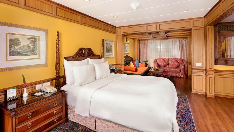 a king size bed and a bedside drawer - Mayfair Hill Resort, Darjeeling 2