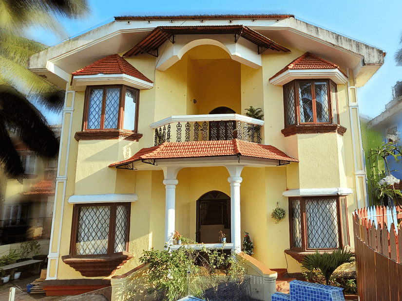 A bright exterior shot of the Amara Villa, Nagoa, featuring a beautiful entrance.