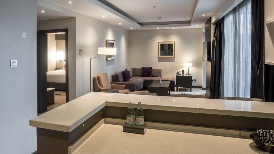 Spacious hotel suite at Best Western Premier Westlands with separate living and sleeping areas.