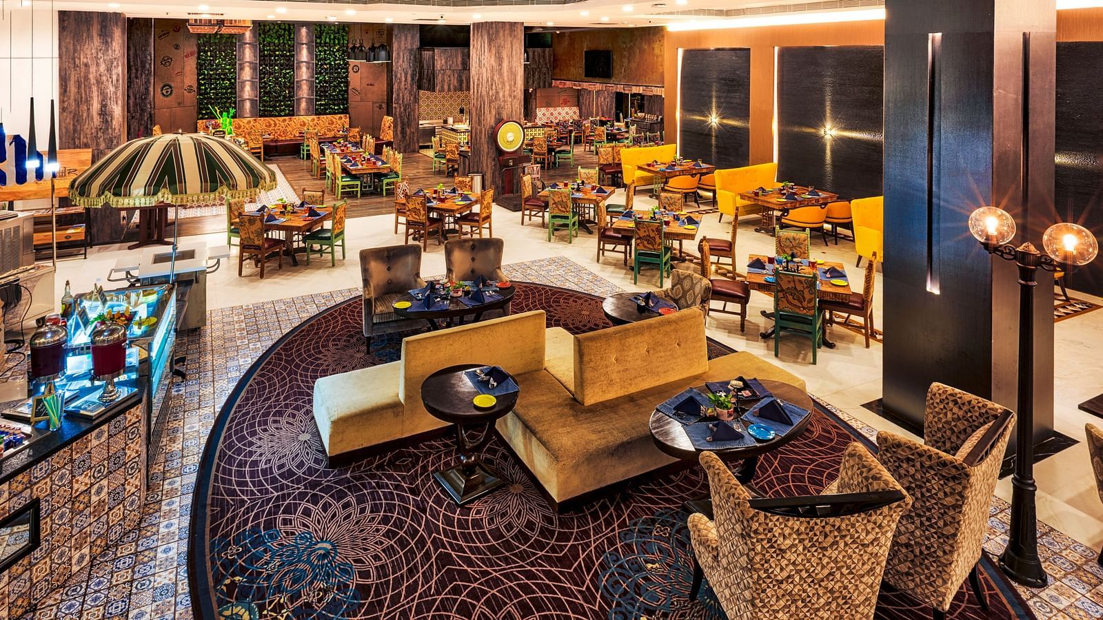 Seating arrangement of the restaurant at Grand Chennai By GRT Hotels.