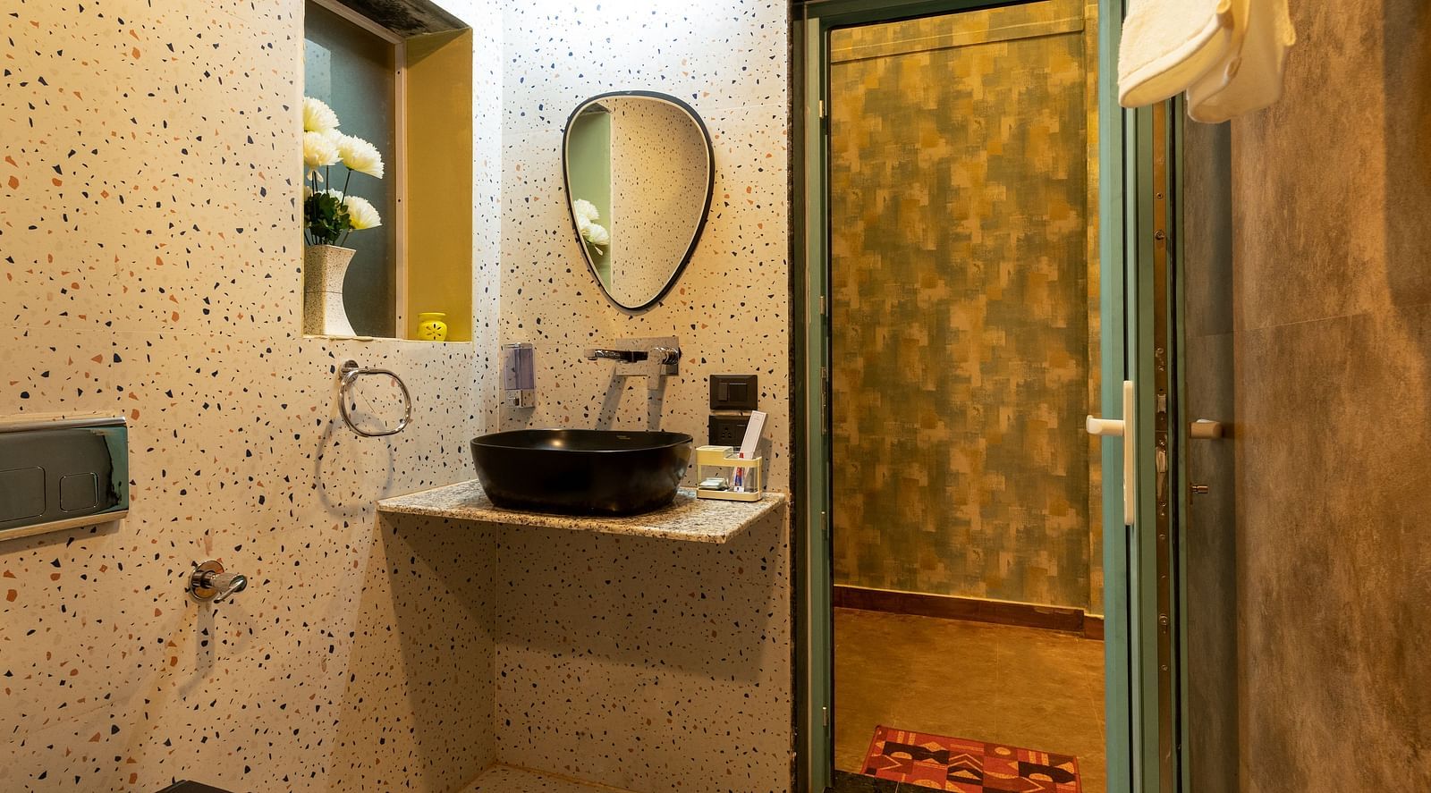 Vanity area in the restroom at Infinitea Retreat Bir