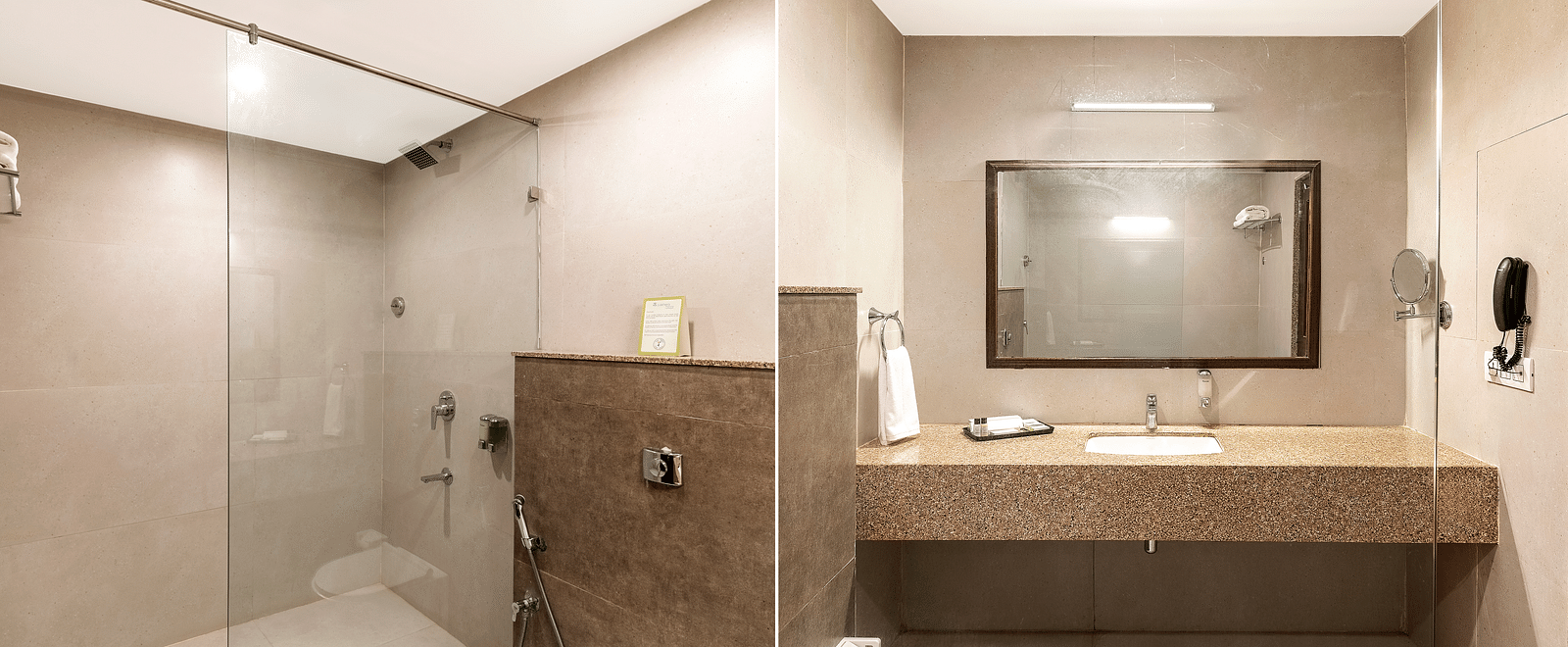 A  split bathroom view, showcasing a glass-door shower on one side and a sink with a large mirror on the other - Via Lakhela Resort & Spa, Kumbhalgarh