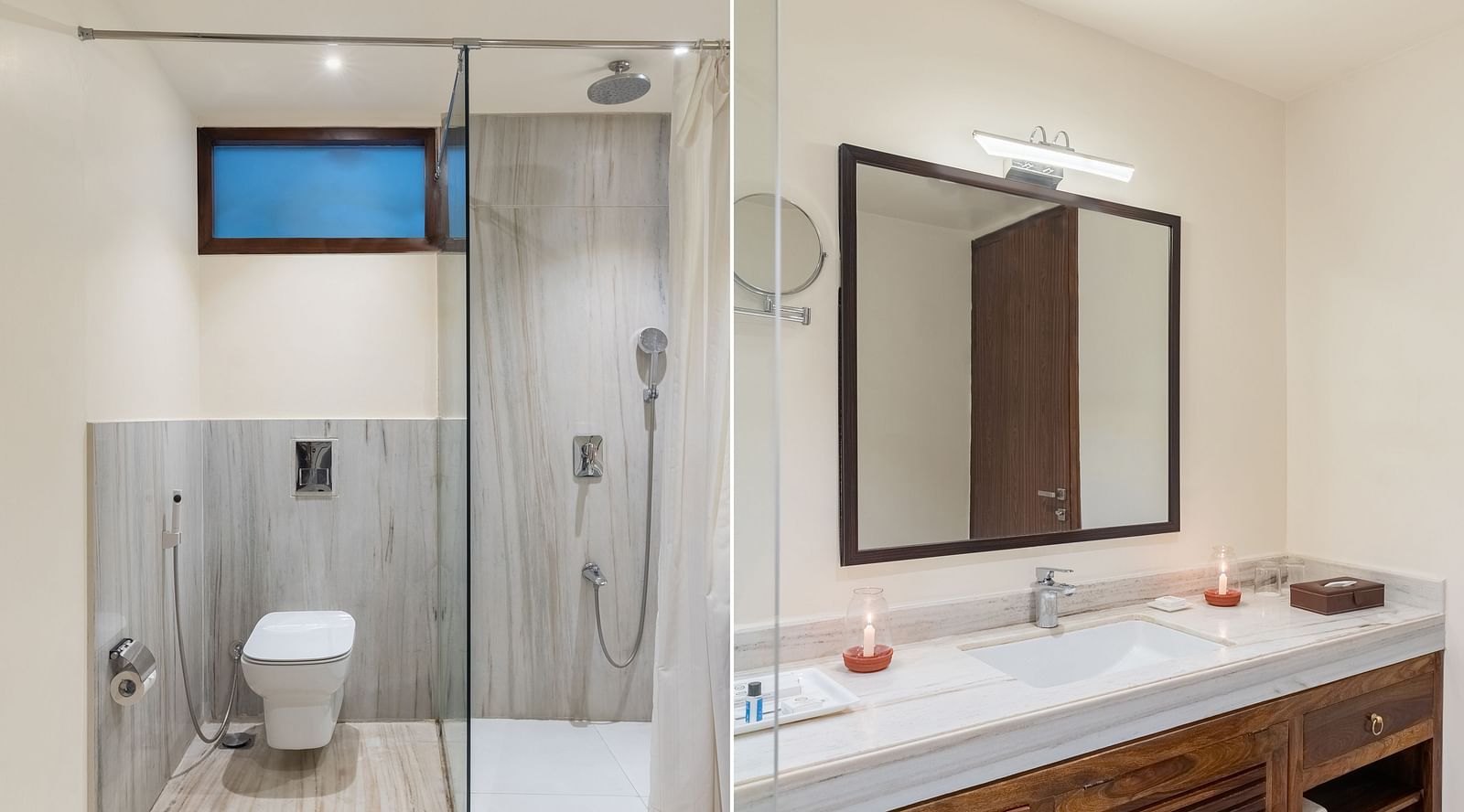 image of a luxurious and a well appointed bathroom with a huge mirror in the luxury pond view villa at aranya vilas