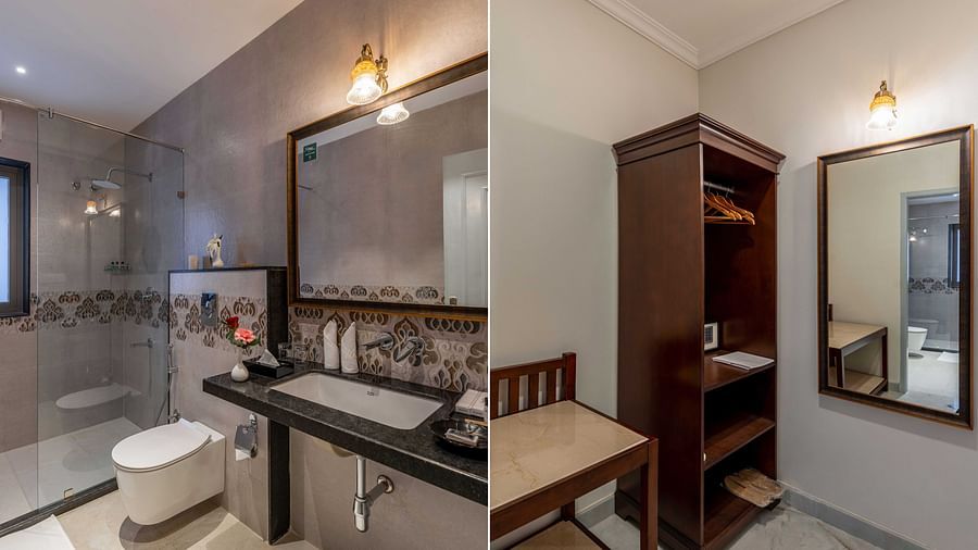 A view of wardrobe and bathroom at Maan Vilas Suite - Maan Vilas by Stone Wood, Udaipur