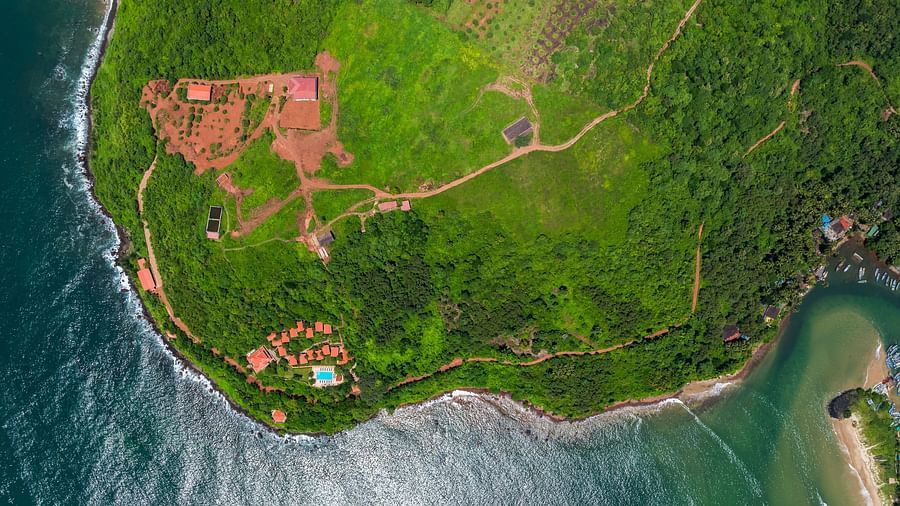 An aerial image of our resort in Sindhudurg on a hilltop by the side of the sea - Highland Sarovar Portico, Sindhudurg